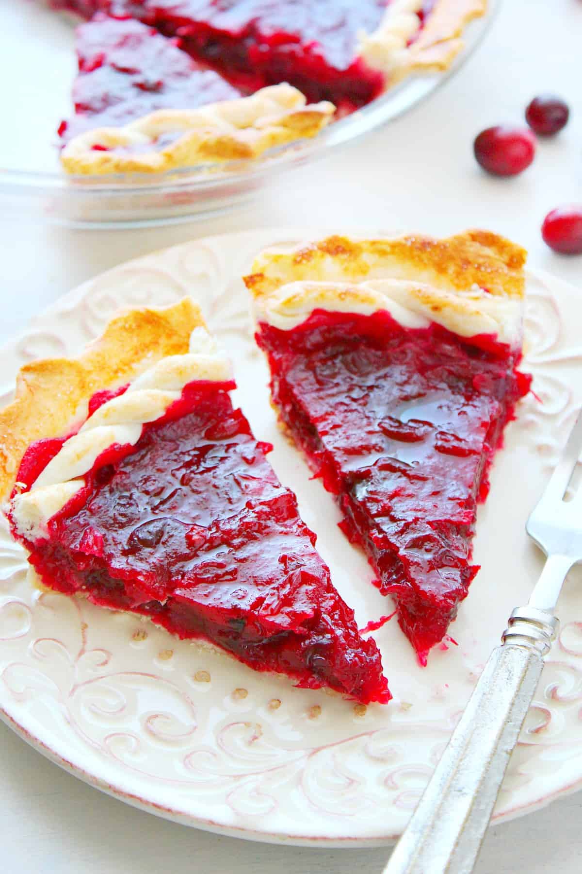 Cranberry pie slices on a plate.