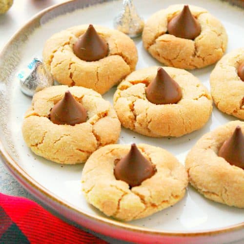 Cookies with chocolate candy on a plate.