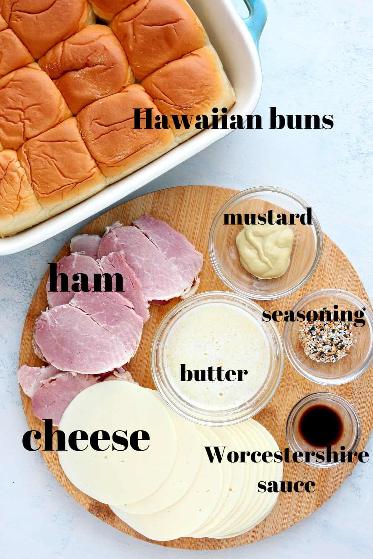 Ingredients for sliders on a board.