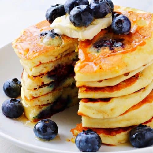 Blueberry pancakes on a plate.