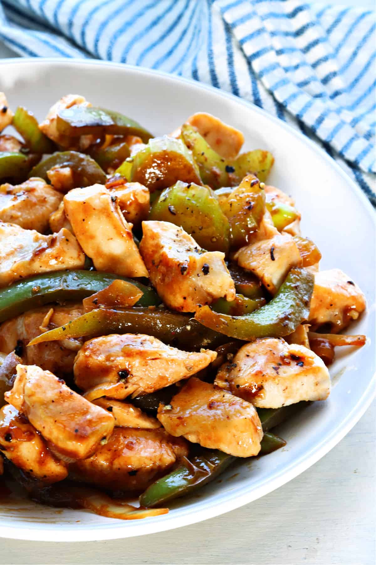Black Pepper Chicken recipe Chicken with veggies on a plate.