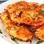 Coconut chicken pieces on a plate.