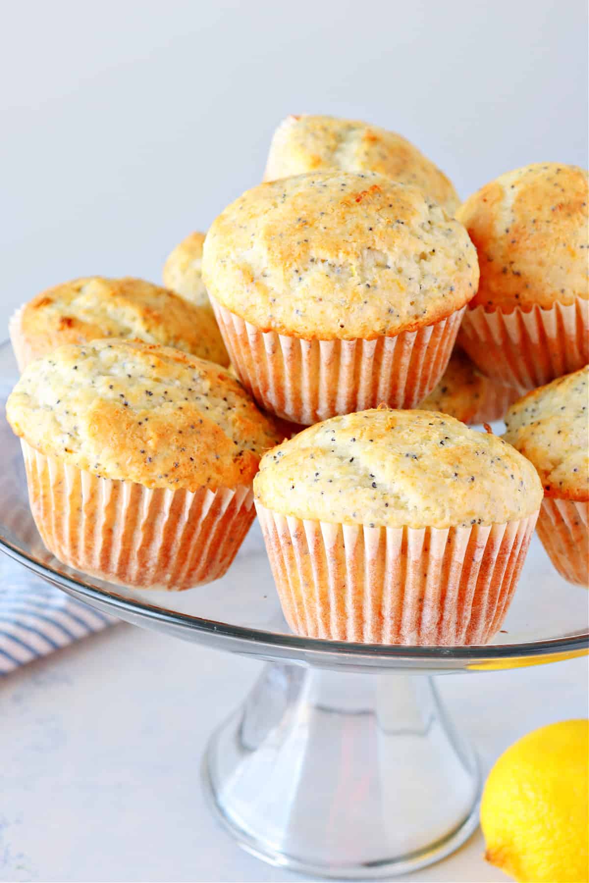 Muffins on a glass stand.