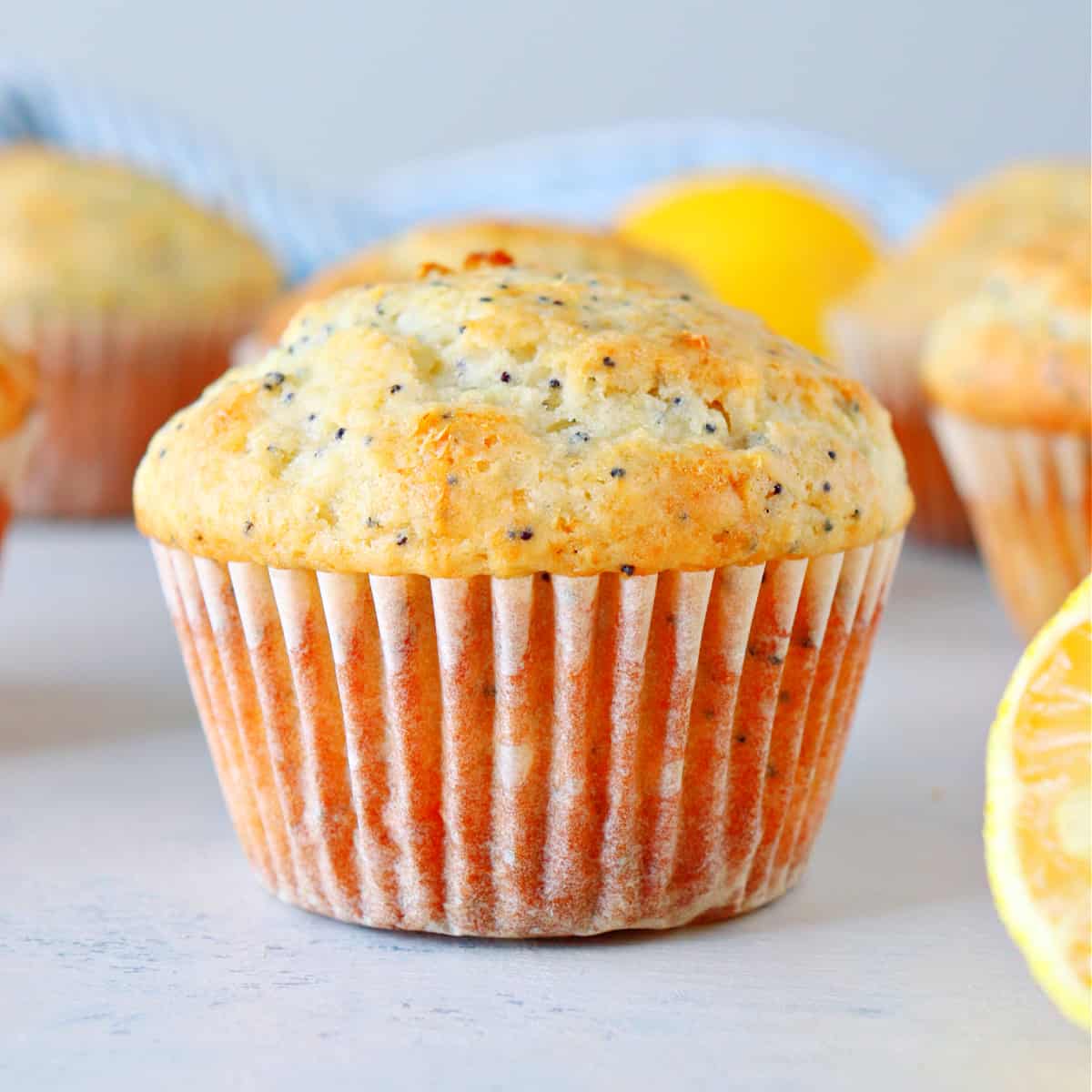 Lemon muffin on a board.