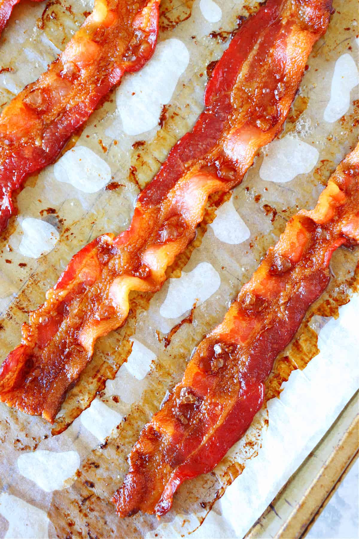 Crispy bacon on parchment paper.