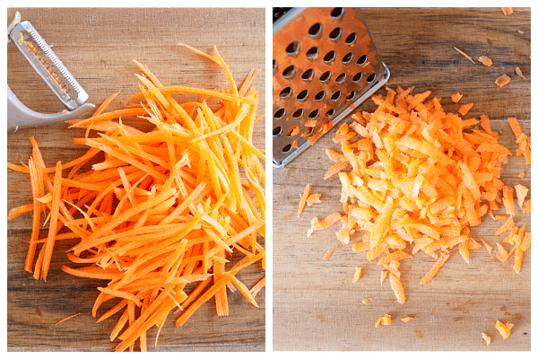 Shredded carrots on cutting board.