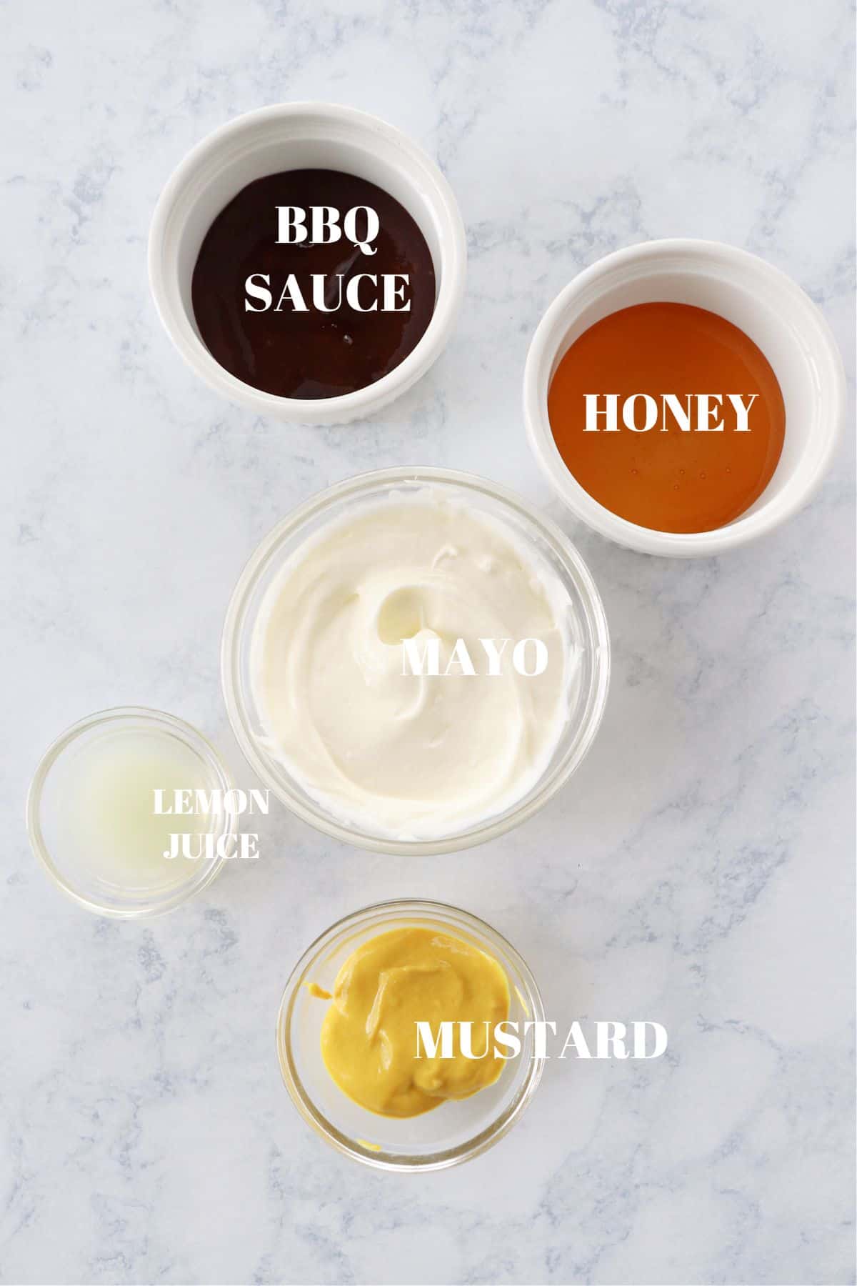 Ingredients for Chick-fil-A sauce on marble board.