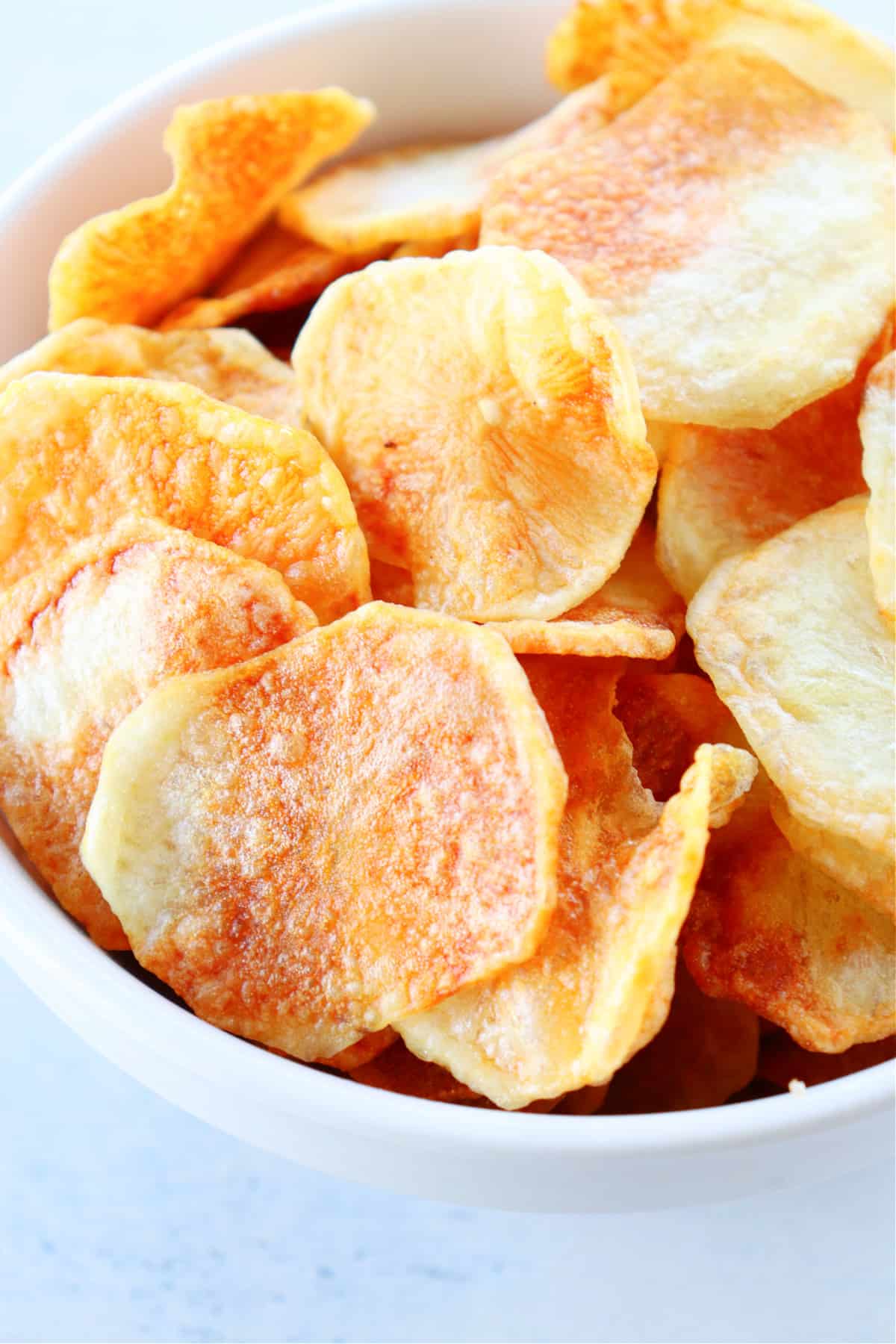 Close up shot of air fryer potato chips.