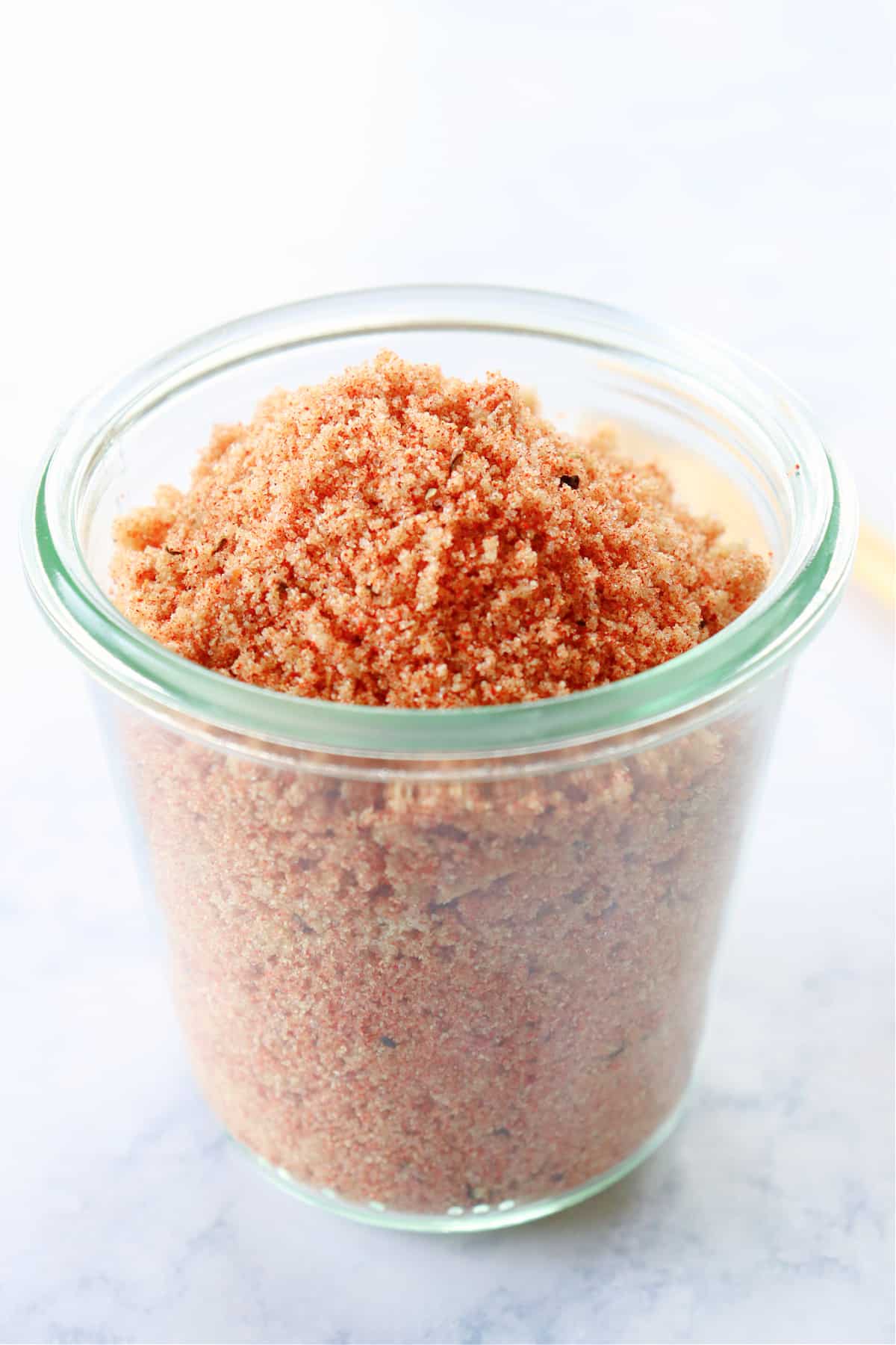 Dry Rub recipe Dry rub in a glass jar.