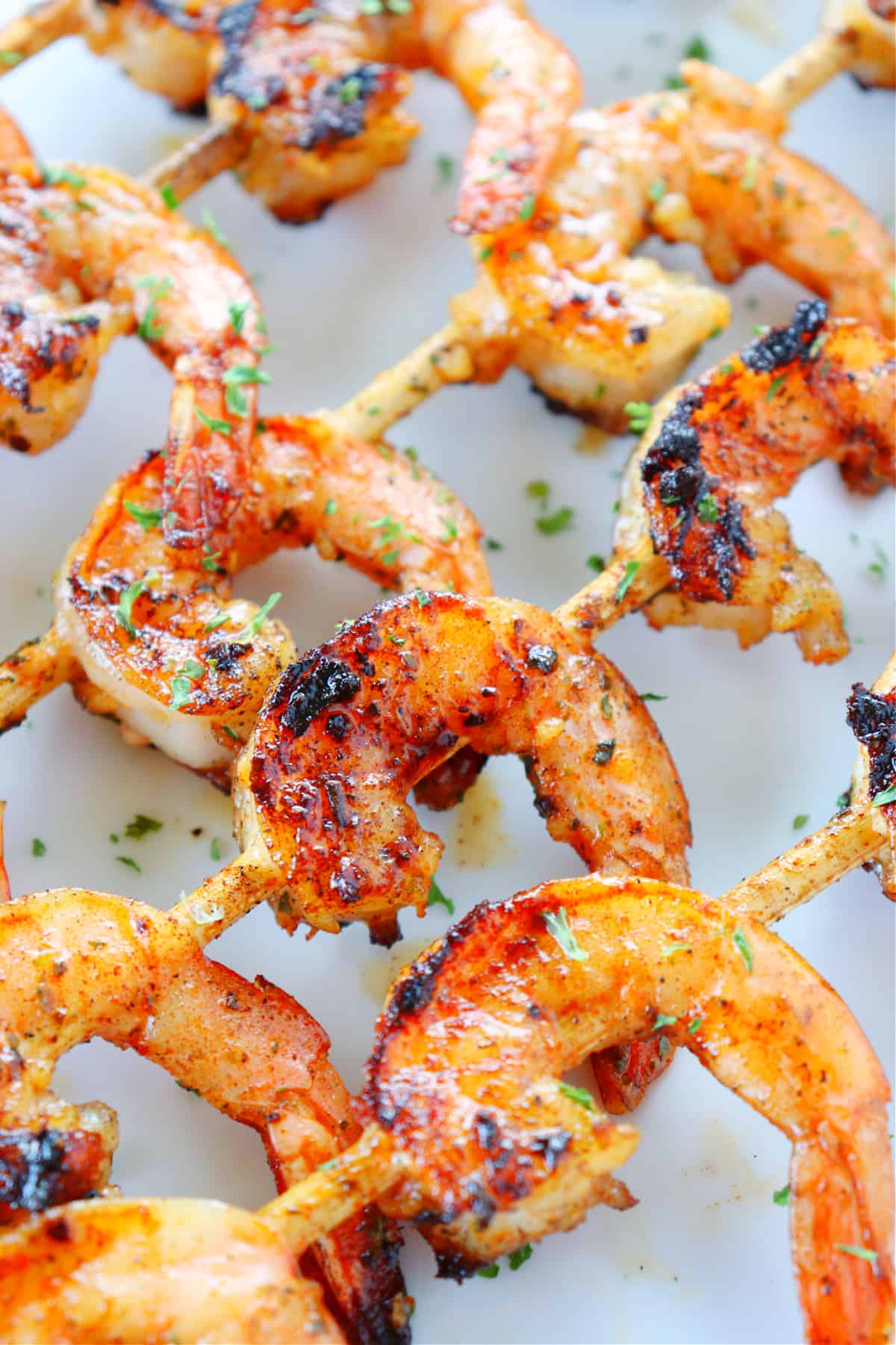 Grilled shrimp on plate.
