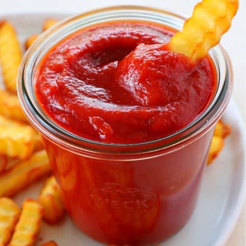 Homemade ketchup in a jar.