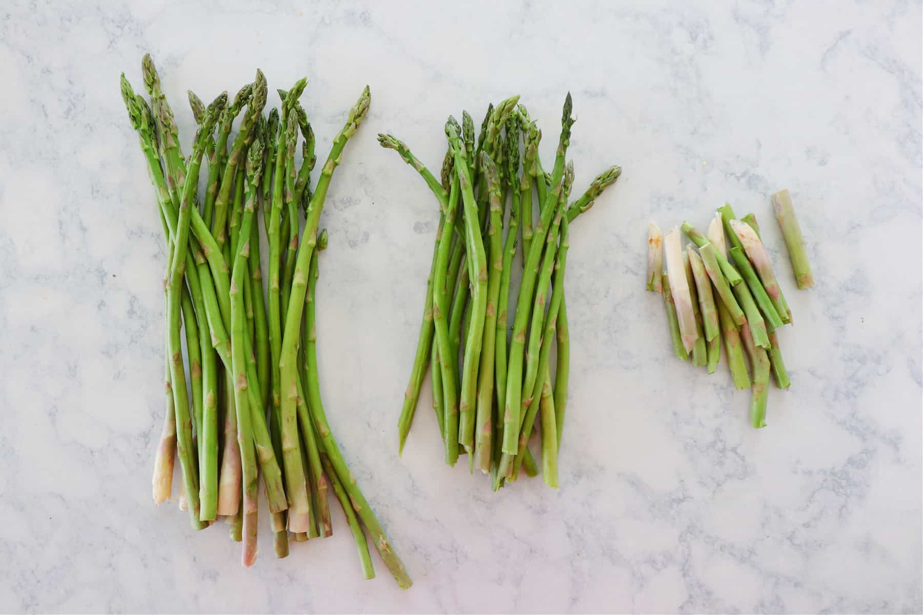 Asparagus being trimmed.