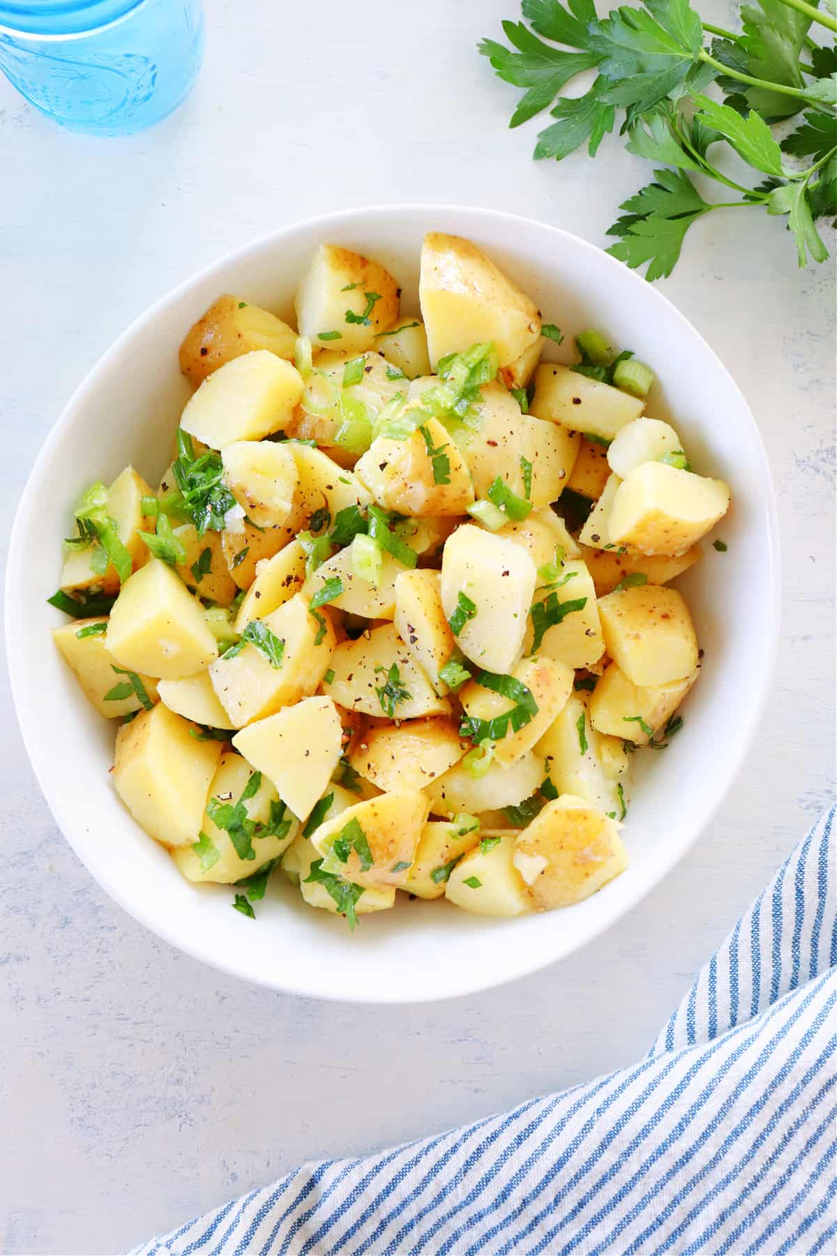 Overhead shot of potato salad in a bowl.