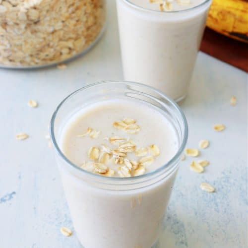 Two oatmeal smoothies in glasses.