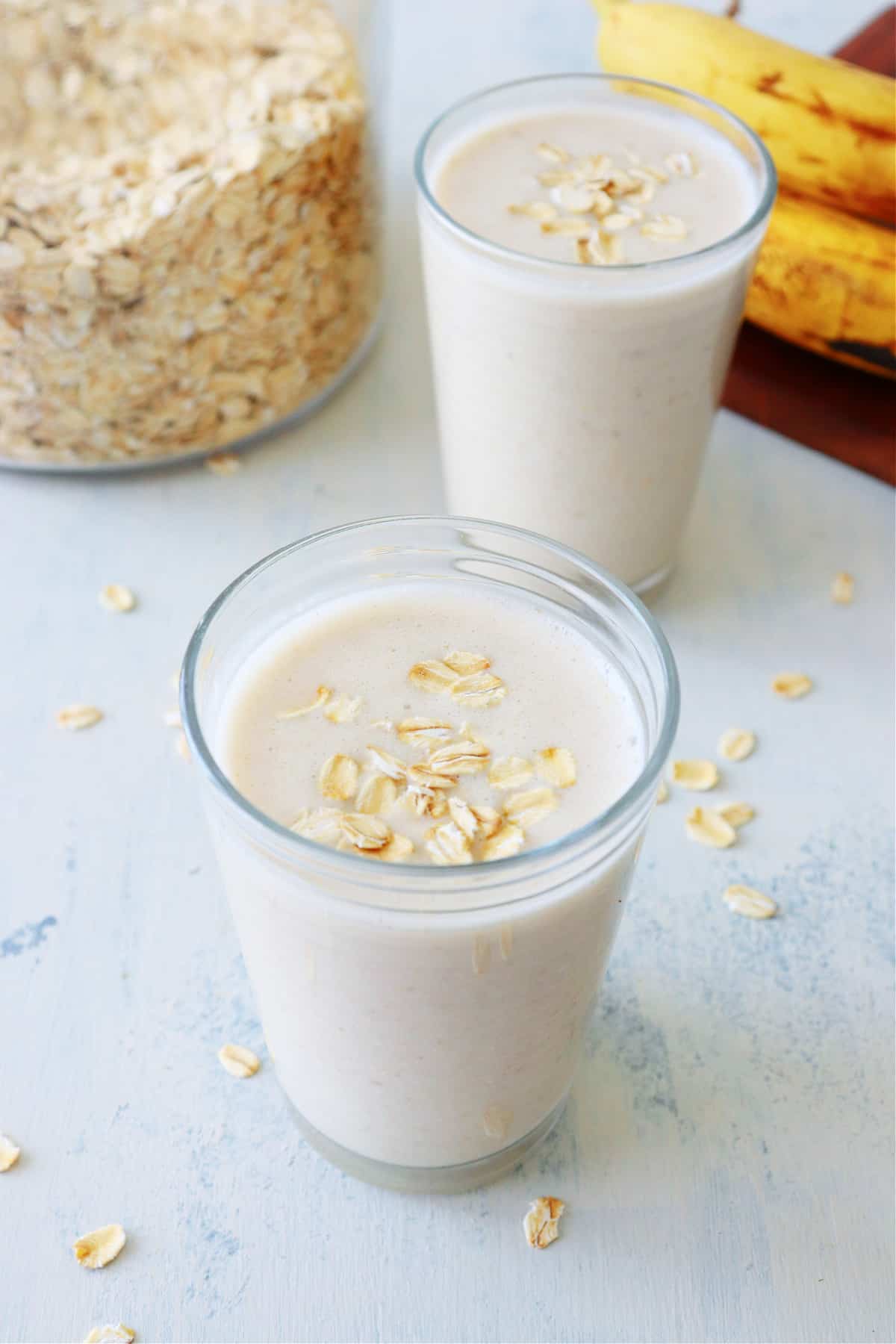 Two oatmeal smoothies in glasses.