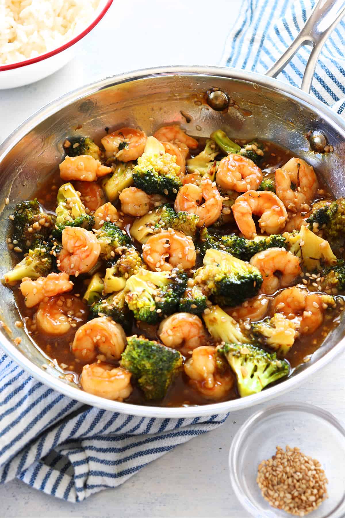 Shrimp and broccoli in a pan.