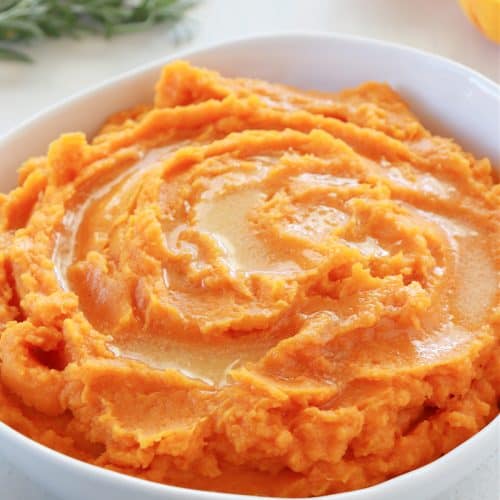 Close up shot of mashed sweet potatoes.