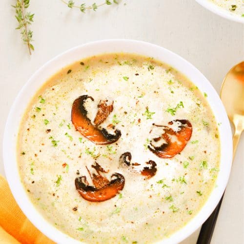 Close up of mushroom soup in a bowl.