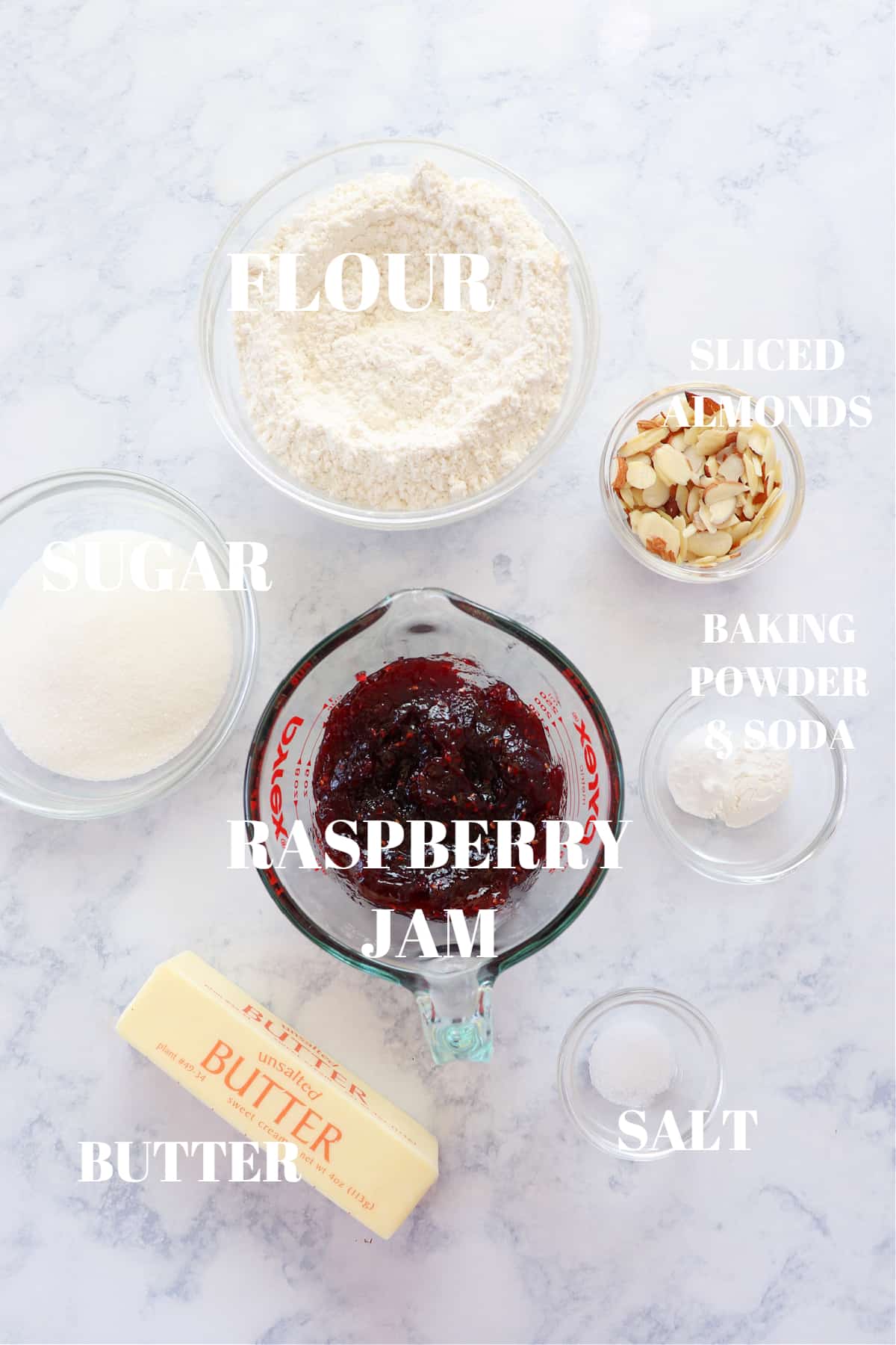 Ingredients for raspberry bars on a board.