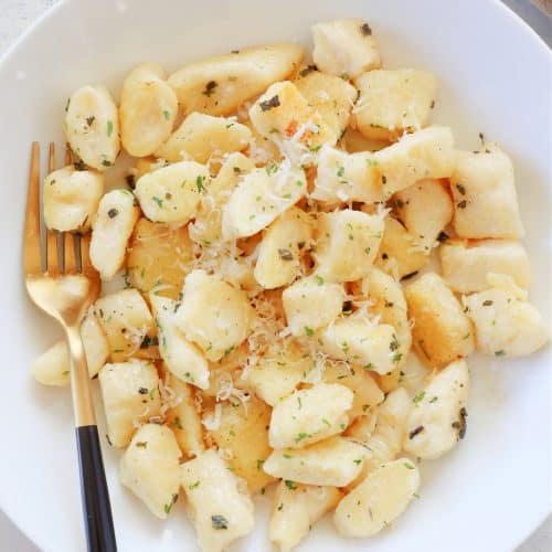 Gnocchi in a white bowl.