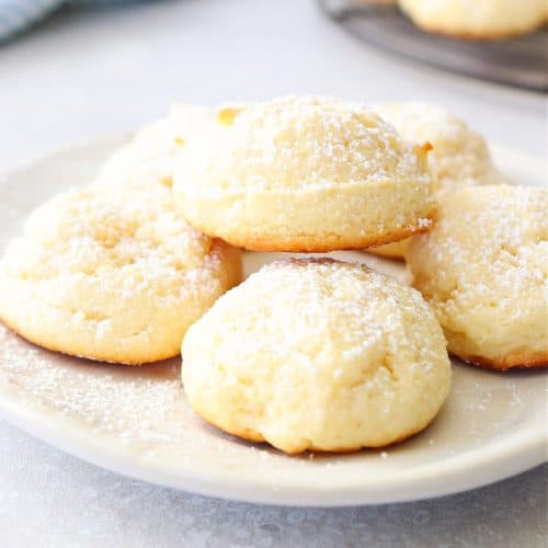 Cream cheese cookies on a plate.