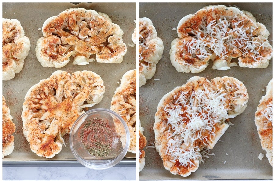 Cauliflower slices seasoned on a baking sheet.