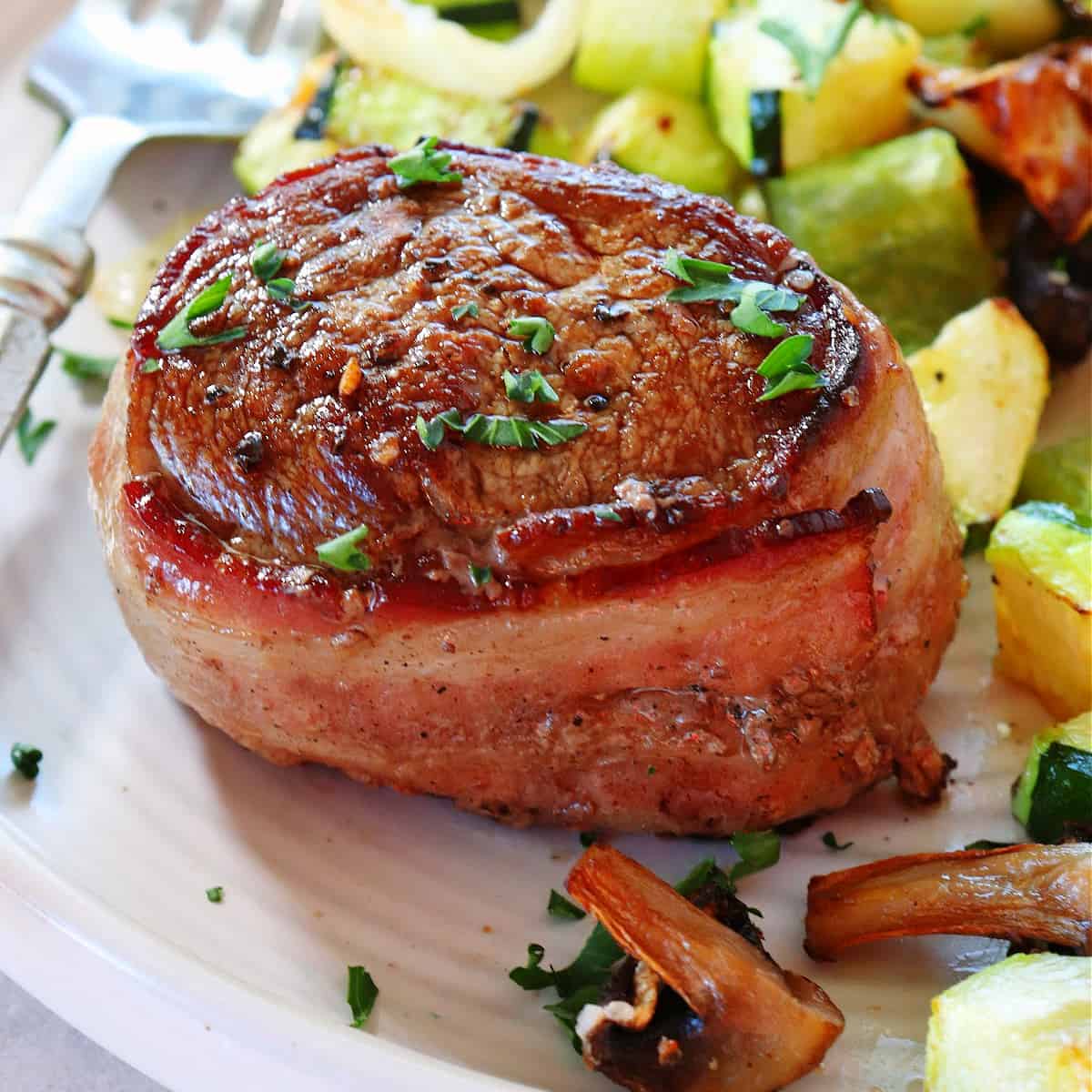 Filet mignon on a plate.