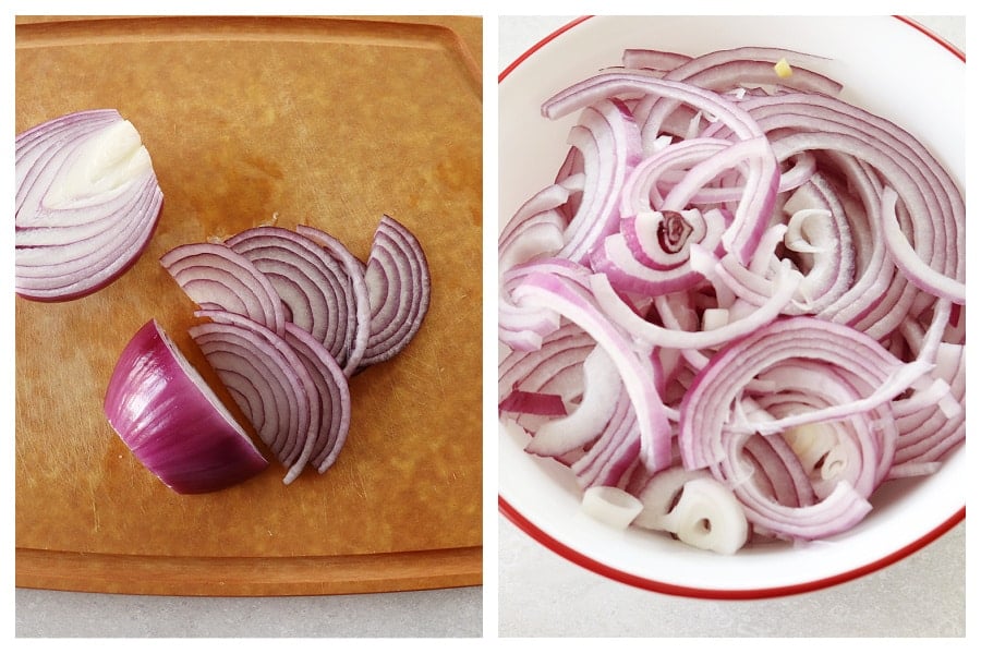 Red onions sliced on a cutting board and in a bowl.