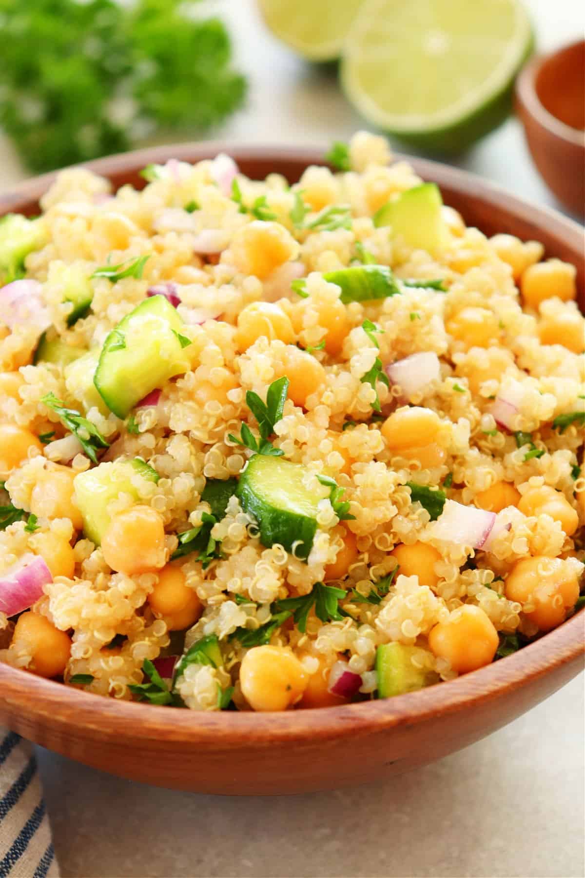 Quinoa salad in a wooden bowl.