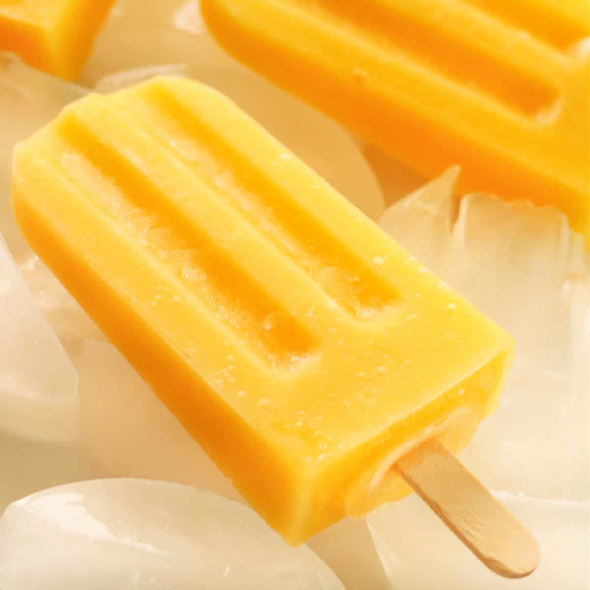 Mango popsicles on ice.