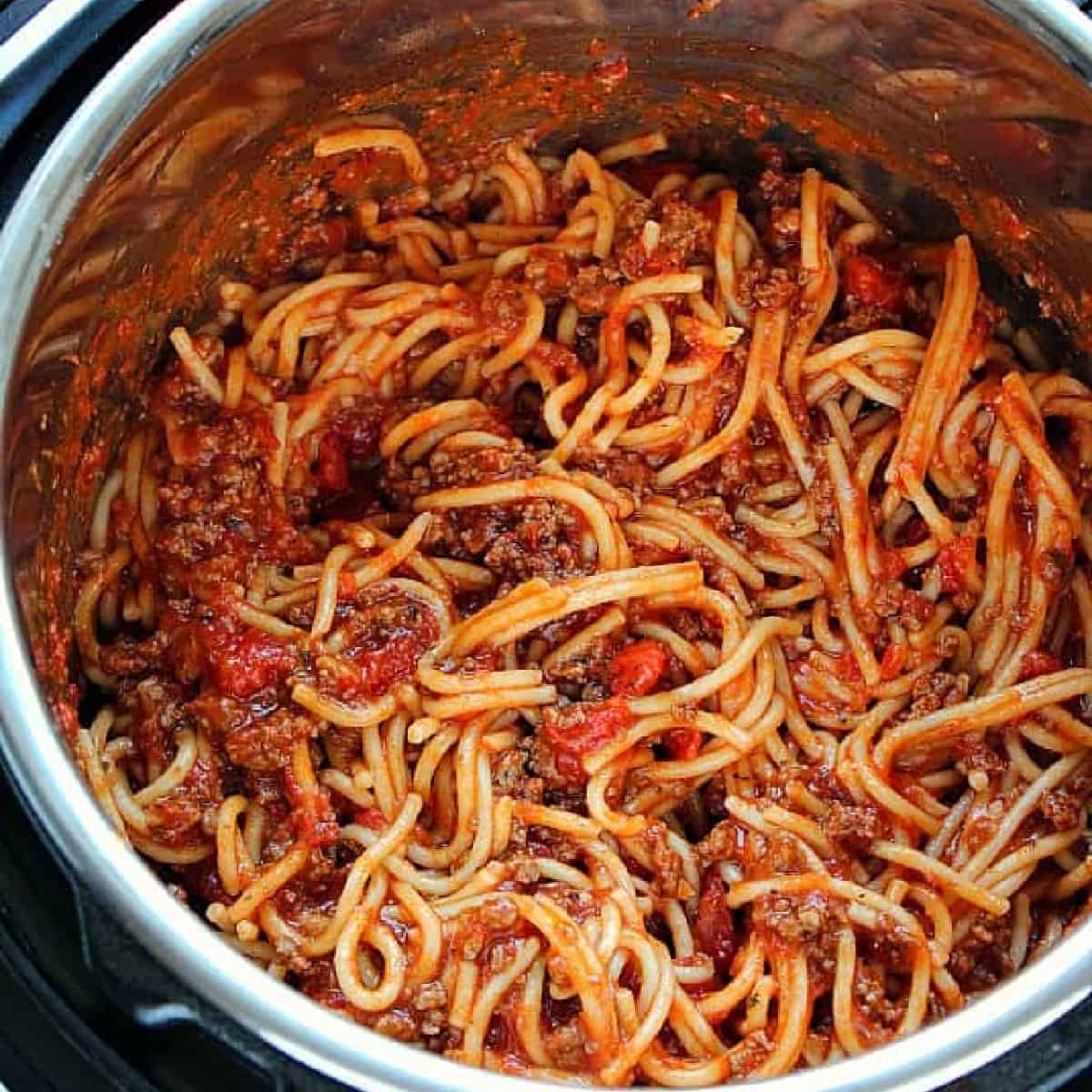 Close up photo of spaghetti with beef in the Instant Pot pressure cooker.