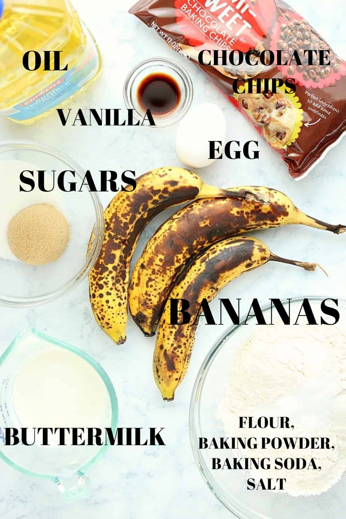 Ingredients for banana bread on a marble board.